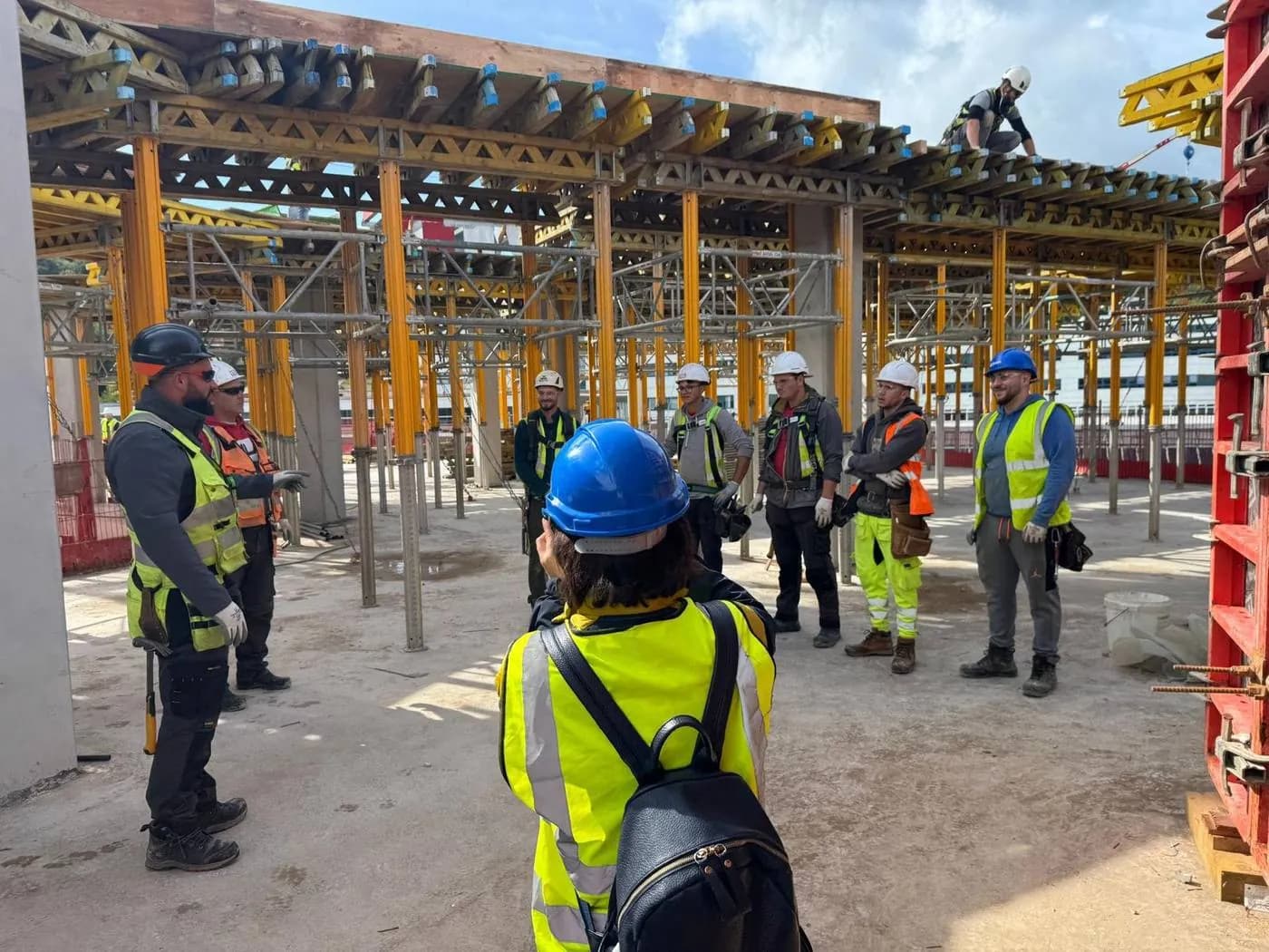 Cristina from Happy People Learning Centre on site with a working team